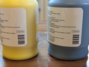 Farbflaschen des Canon Maxify GX4050 Multifunktionsdruckers im Lieferumfang Nahansicht