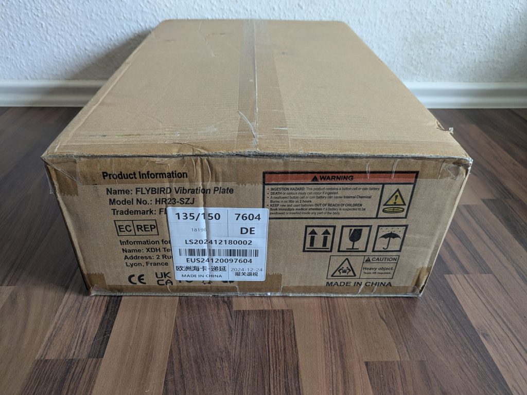 Verpackung der FLYBIRD Mini Vibrationsplatte von der Seite