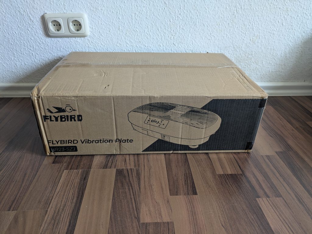 Verpackung der FLYBIRD Mini Vibrationsplatte von vorne
