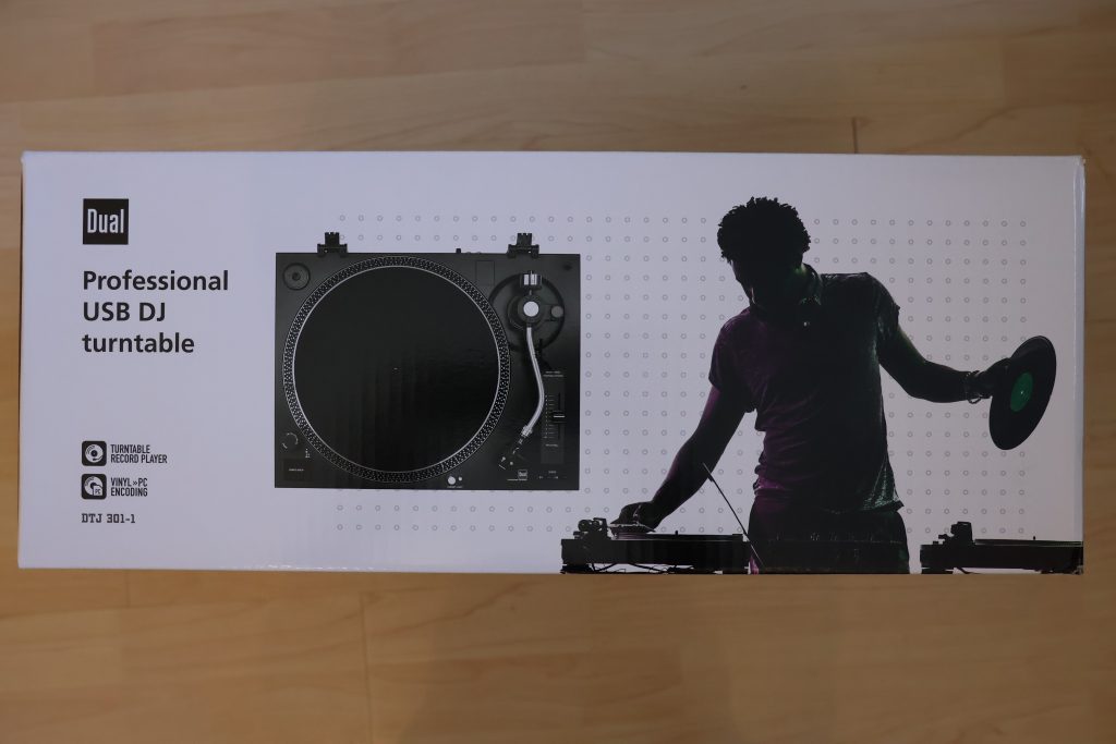 Verpackung des Dual DTJ 301.1 Plattenspielers von der Front