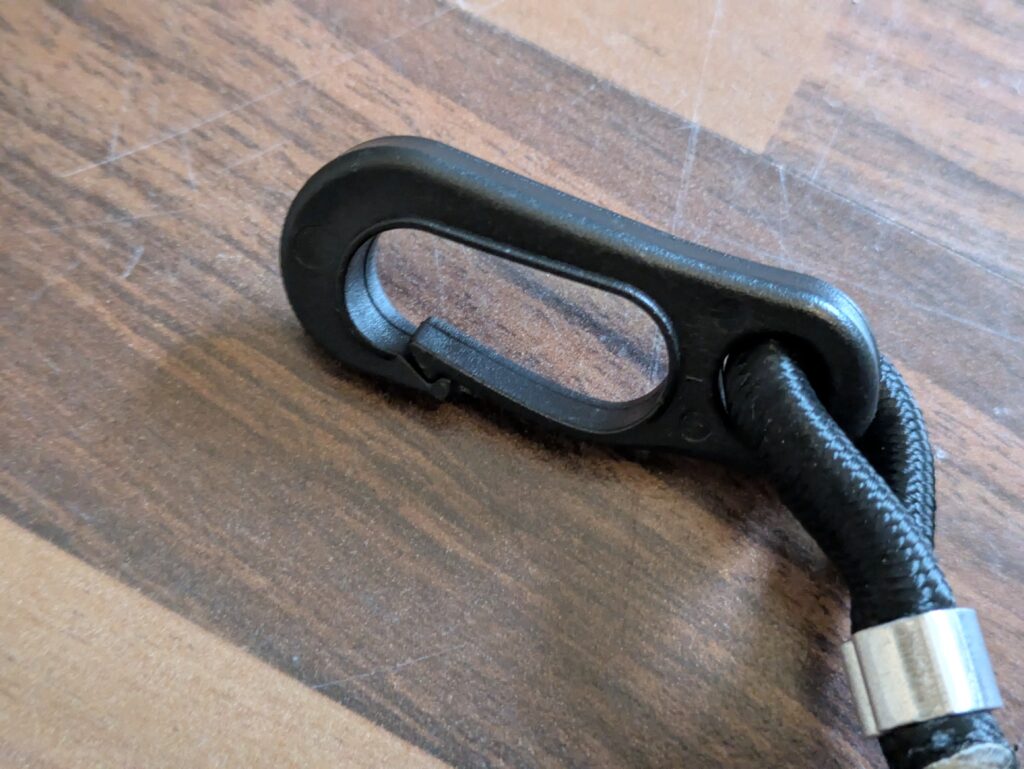 Karabinerhaken der Expandbänder der Dripex Vibrationsplatte