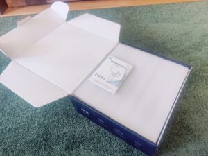 Lefity JX-703S Massagepistole Verpackung geöffnet