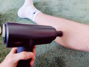Lefity JX-703S Massagepistole Einsatz an der Wade