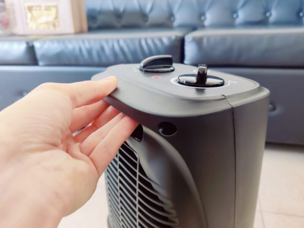 Pelonis PHF101BPBHDE Heizlüfter getragen