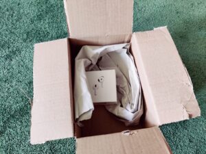 Apple AirPods 4 Bluetooth-Kopfhörer Umverpackung offen