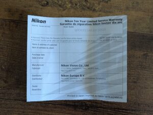 Garantiekarte des Nikon Sportstar EX 10x25 DCF Fernglas