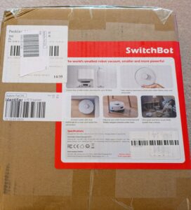 Verpackung des SwitchBot K11+ Staubsauger-Roboters von oben
