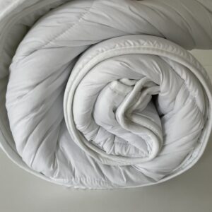 Siebenschläfer Vier-Jahreszeiten-Decke gerollt