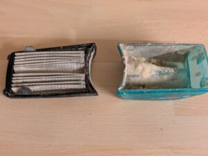 Staubbox des Bosch Professional GEX 125-1 AE Exzenterschleifer mit Inhalt