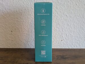 Verpackung der COSLUS C20 Munddusche von links