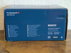 Verpackung des Bosch Professional GEX 125-1 AE Exzenterschleifers von unten