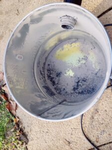 Navaris Aschesauger Behälter nach Nutzung