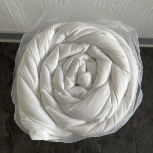 sleepling Vier-Jahreszeiten-Decke gerollt