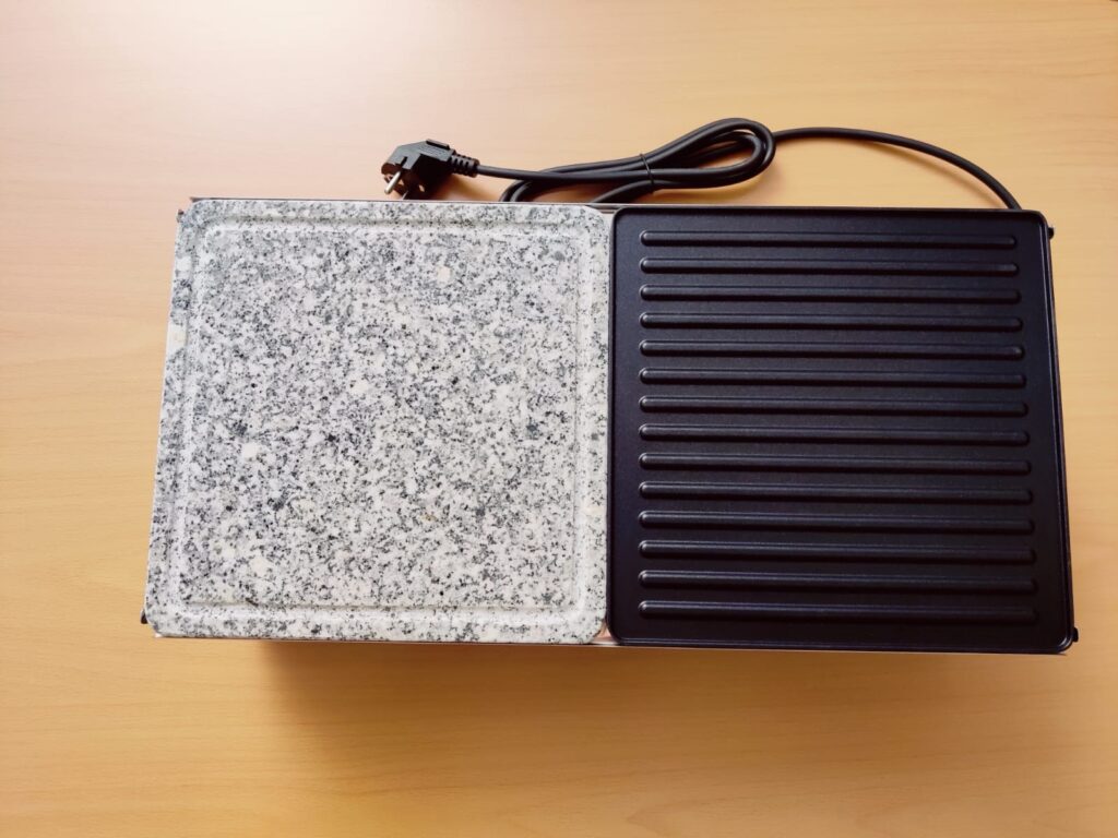 Rommelsbacher RCS 1350 Raclette Natursteinplatte und geriffelte Platte