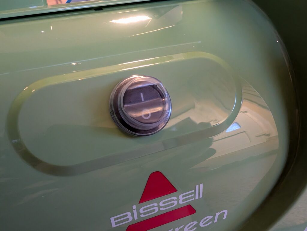 BISSELL Little Green Waschsauger Einschaltknopf