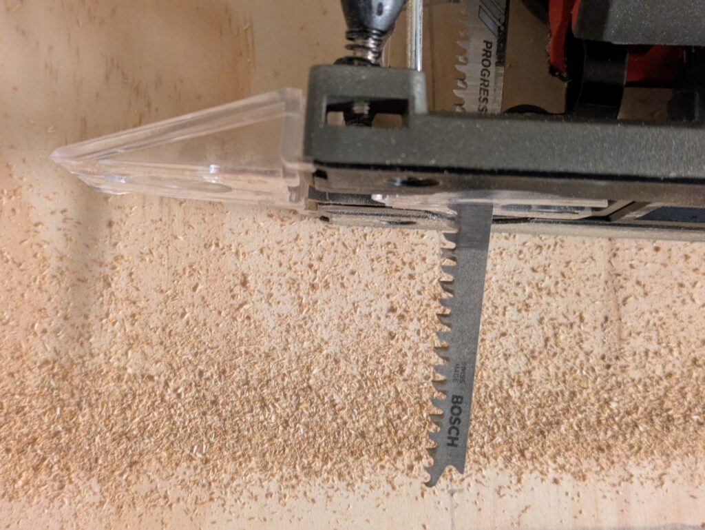 Einhell TE-JS 1880 Li – Solo Stichsäge mit Sägeblatt und Sägemehl