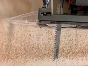 Einhell TE-JS 1880 Li – Solo Stichsäge mit Sägeblatt und Sägemehl