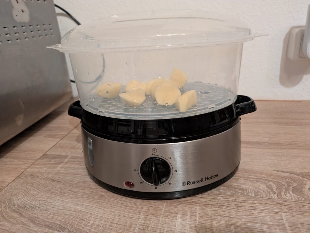 Russell Hobbs cook@home Dampfgarer mit einem Garbehälter