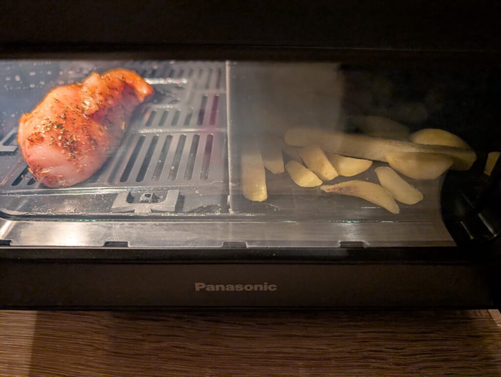 Panasonic NF-BC1000 Flex Heißluftfritteuse Hähnchen und Pommes Zubereitung