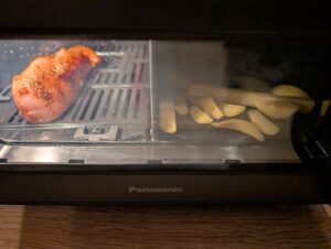 Panasonic NF-BC1000 Flex Heißluftfritteuse Hähnchen und Pommes Zubereitung