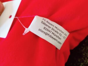 FC Bayern München 2-in-1 Nackenkissen Etikett